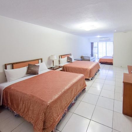 Palm Tree Hotel Кэньдин Экстерьер фото